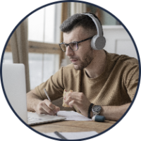 young-man-studying-library-using-laptop